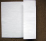 Unfold the paper. Then fold one side in to the crease you made. Step 2