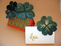 origami-4-leaf-clovers in display stands